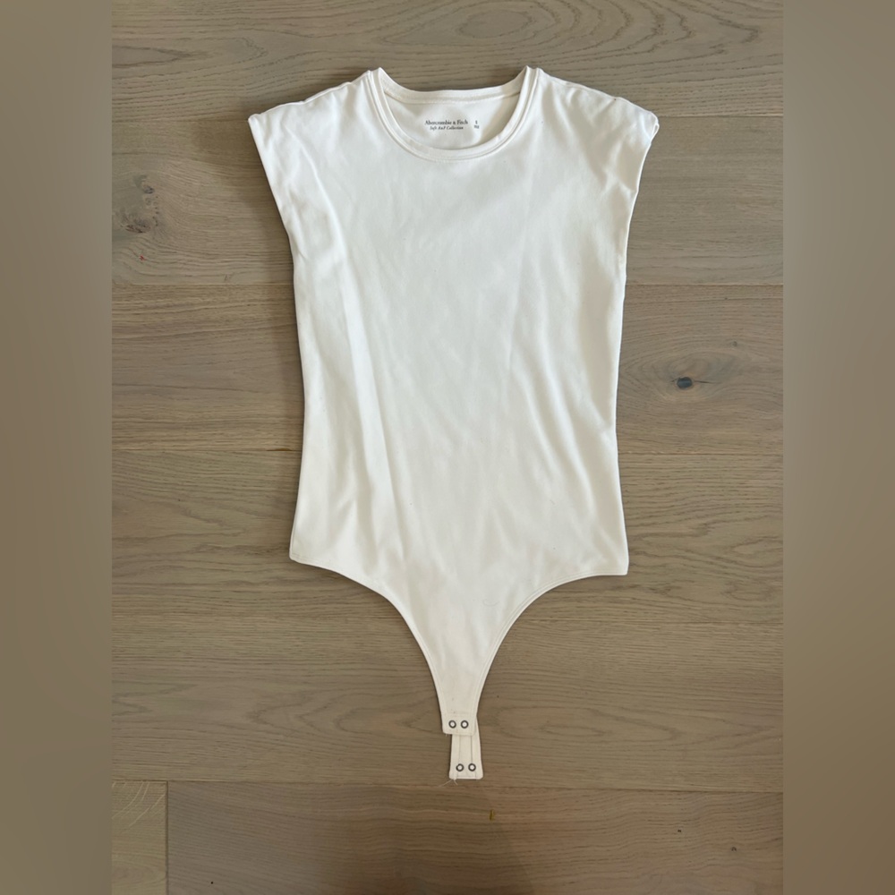Abercrombie women’s White Bodysuit with padded shoulders